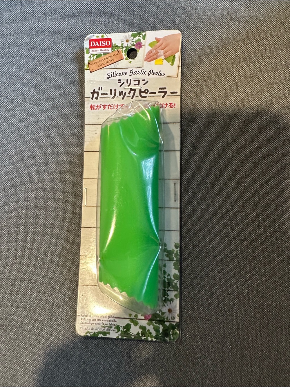 Daiso Silicone Garlic Peeler - bright green